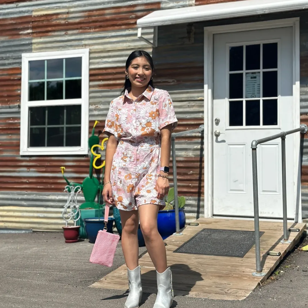 Pink floral button front romper