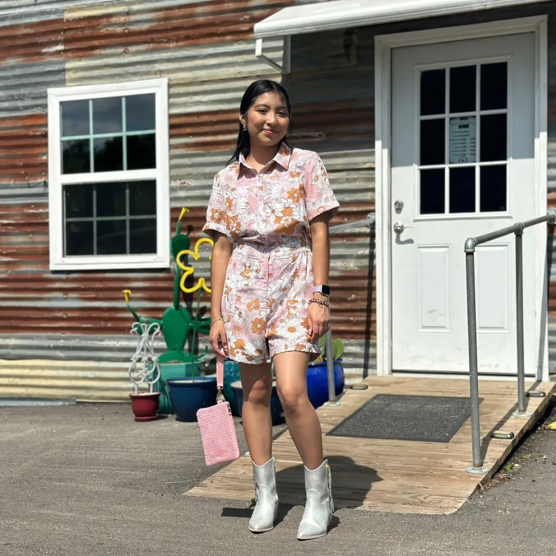 Pink floral button front romper