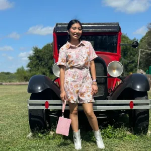 Pink floral button front romper