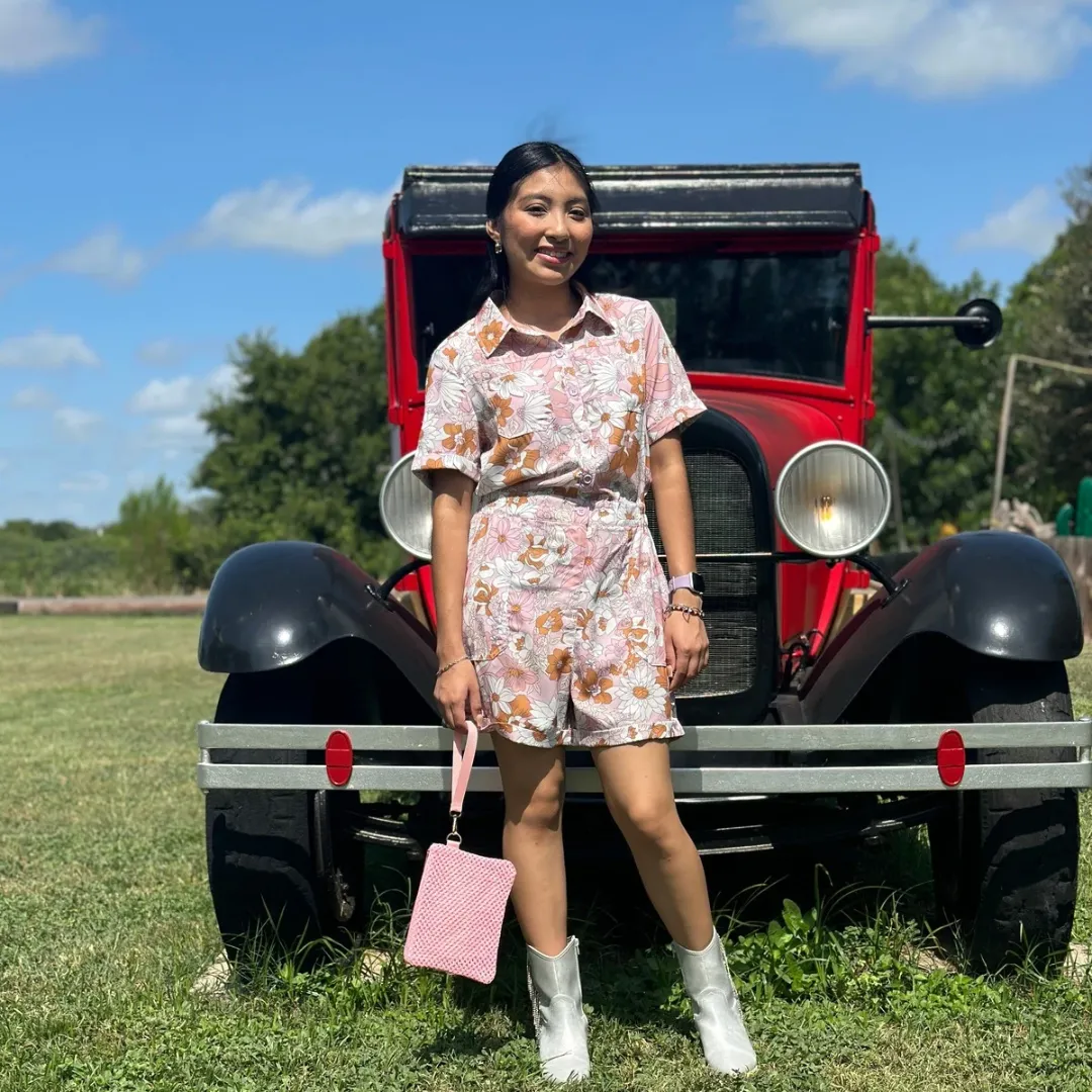 Pink floral button front romper